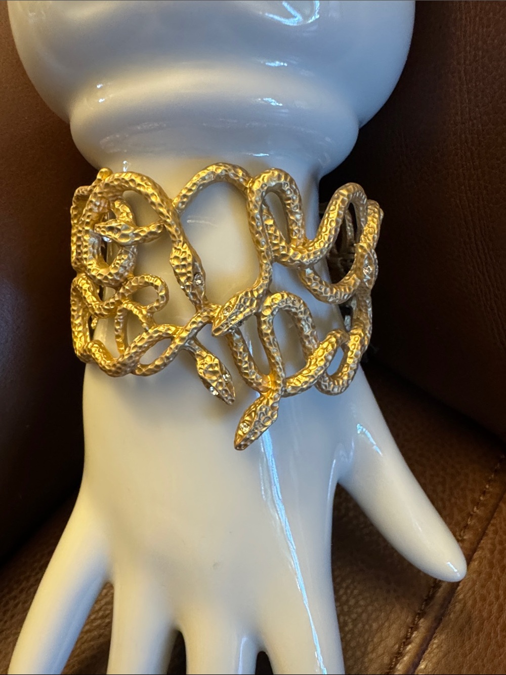 NWT textured gold tone entwined multi-snake clamper bracelet w/white crystal eye